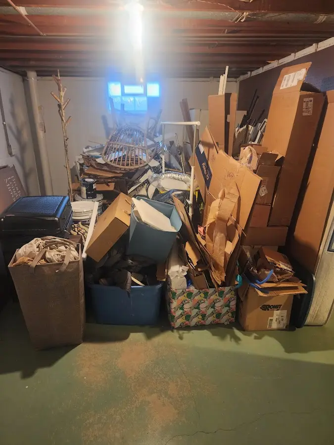 Roll-off dumpster container at job site for 4 Yard Dumpster Rental in Wailuku